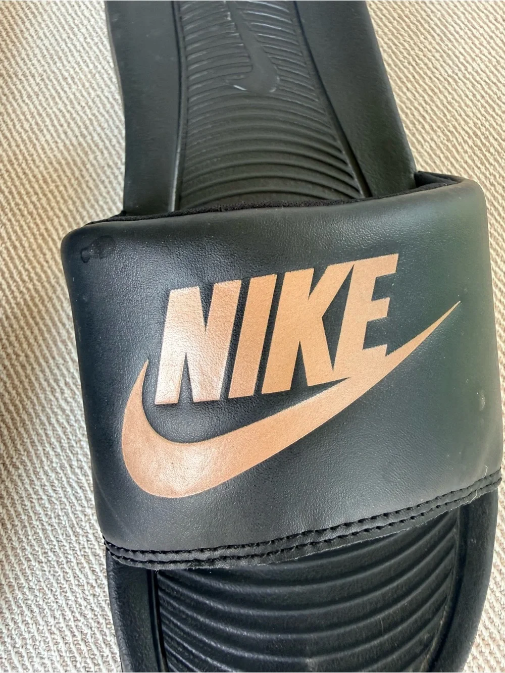 Nike Women’s  Black Slides with Metallic Gold Swoosh